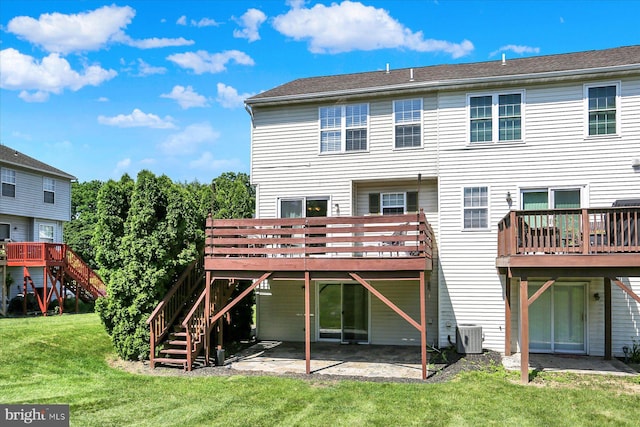 309 Lincoln Ave, Harrisburg, PA 17111 - rear view of house featuring stairs, a lawn, a wooden deck, and a patio