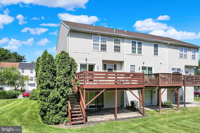 309 Lincoln Ave, Harrisburg, PA 17111 - rear view of house with a wooden deck, stairs, a lawn, and a patio
