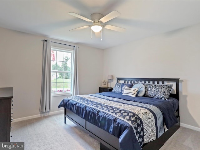 443 Executive Way, Hedgesville, WV 25427 - carpeted bedroom featuring baseboards and a ceiling fan