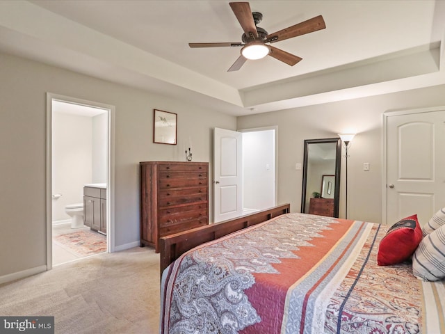 443 Executive Way, Hedgesville, WV 25427 - bedroom with light carpet, a raised ceiling, ensuite bathroom, and a ceiling fan
