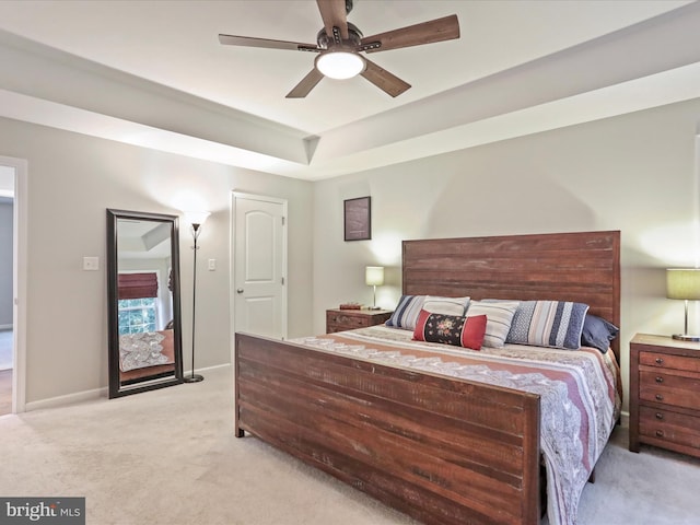 443 Executive Way, Hedgesville, WV 25427 - bedroom featuring light carpet, ceiling fan, and a tray ceiling
