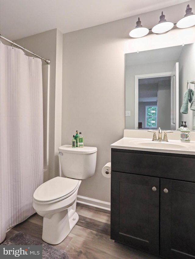 443 Executive Way, Hedgesville, WV 25427 - bathroom featuring vanity, wood finished floors, and a shower with curtain