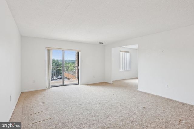 10306 Valley Forge Cir Unit 306, King Of Prussia, PA 19406 - spare room with light colored carpet and baseboards