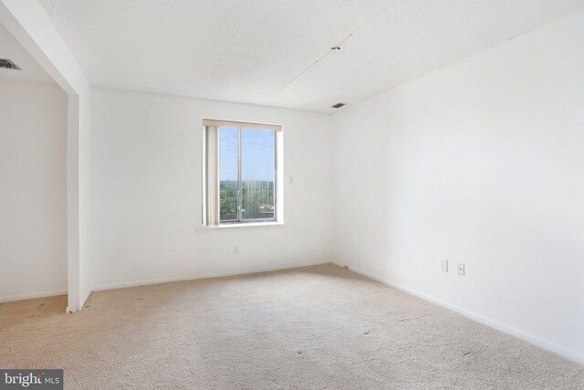 10306 Valley Forge Cir Unit 306, King Of Prussia, PA 19406 - empty room with carpet flooring