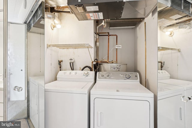 10306 Valley Forge Cir Unit 306, King Of Prussia, PA 19406 - washroom with separate washer and dryer