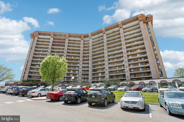 10306 Valley Forge Cir Unit 306, King Of Prussia, PA 19406 - view of property with uncovered parking