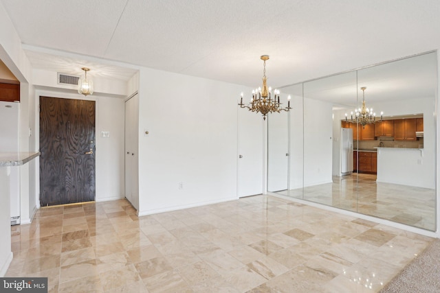 10306 Valley Forge Cir Unit 306, King Of Prussia, PA 19406 - unfurnished dining area featuring a chandelier