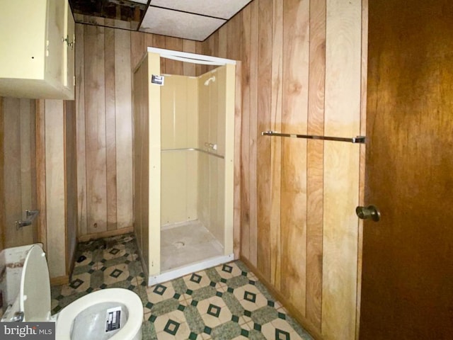 767 Mckean Ave, Donora, PA 15033 - full bathroom featuring wooden walls and a stall shower