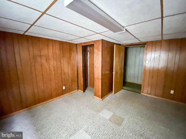 767 Mckean Ave, Donora, PA 15033 - finished below grade area with wood walls, a paneled ceiling, and carpet flooring