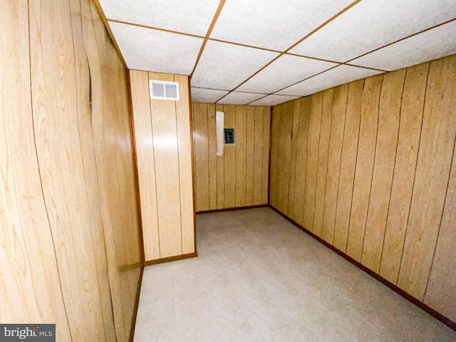 767 Mckean Ave, Donora, PA 15033 - finished below grade area with wood walls, a paneled ceiling, and light colored carpet