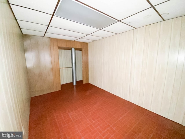 767 Mckean Ave, Donora, PA 15033 - spare room with wooden walls and a paneled ceiling