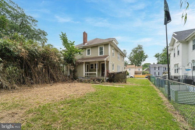 59 Pine St, Beverly, NJ 08010 - back of property featuring a chimney and a porch
