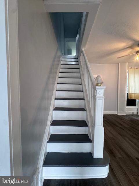 3302 N Palethorp St, Philadelphia, PA 19140 - stairway featuring wood finished floors and a ceiling fan