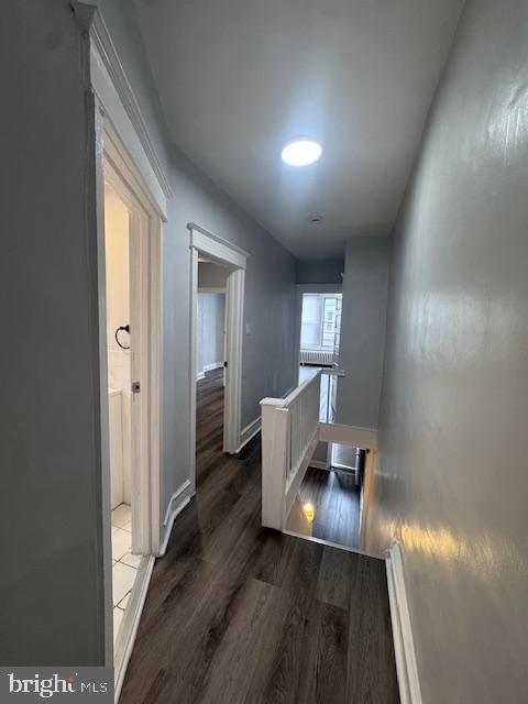3302 N Palethorp St, Philadelphia, PA 19140 - hall featuring dark wood-type flooring and baseboards