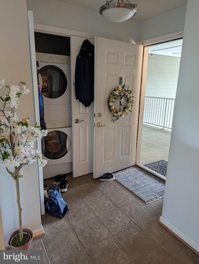 1720 Lake Shore Crest Dr Unit 34, Reston, VA 20190 - laundry room featuring stacked washer / dryer