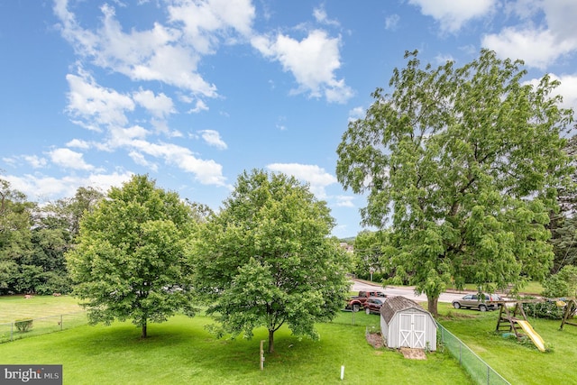 463 Maple St, Manchester, PA 17345 - view of yard with a storage unit and view of wooded area