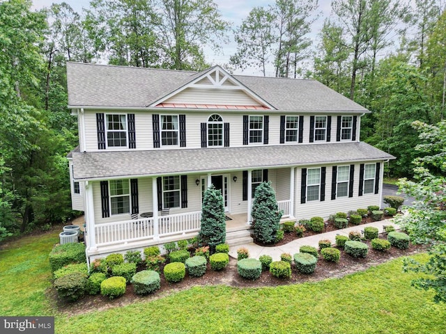 173 Empress Alexandra Pl, Fredericksburg, VA 22406 - colonial home featuring a porch, a shingled roof, a front lawn, and a standing seam roof