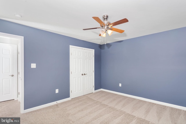 173 Empress Alexandra Pl, Fredericksburg, VA 22406 - unfurnished bedroom with carpet, a closet, and a ceiling fan