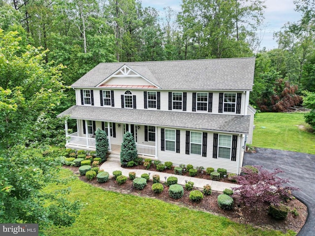 173 Empress Alexandra Pl, Fredericksburg, VA 22406 - view of front of house with a porch, roof with shingles, and a front lawn