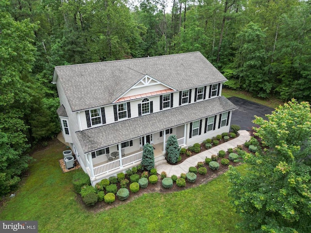 173 Empress Alexandra Pl, Fredericksburg, VA 22406 - view of front of house with roof with shingles, covered porch, a view of trees, and a front lawn
