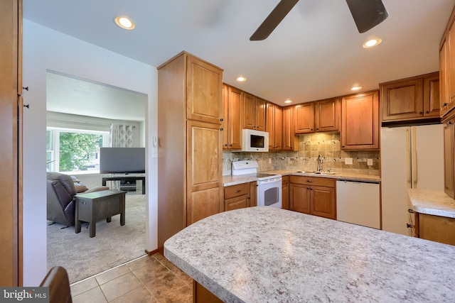 1 Sherman St, Hanover, PA 17331 - kitchen with white appliances, light carpet, ceiling fan, light countertops, and light tile patterned flooring