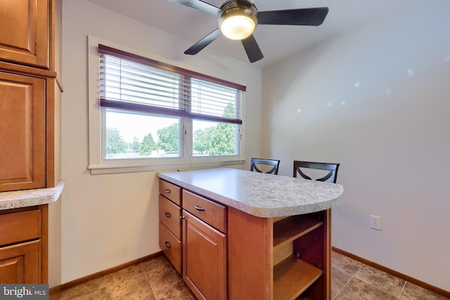 1 Sherman St, Hanover, PA 17331 - kitchen with healthy amount of natural light, light countertops, and brown cabinetry
