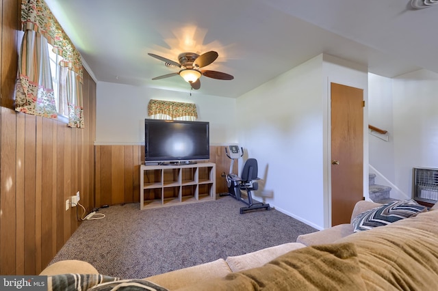 1 Sherman St, Hanover, PA 17331 - living room with stairs, a ceiling fan, carpet floors, wooden walls, and a wainscoted wall