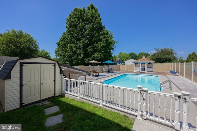 1 Sherman St, Hanover, PA 17331 - view of pool with a gazebo, a storage unit, a fenced backyard, and a patio area