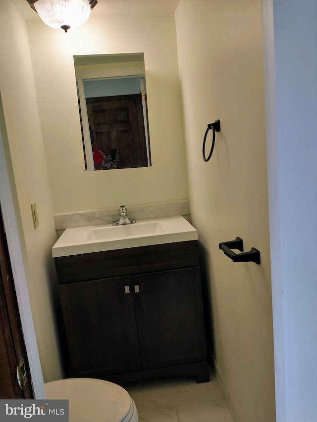 512 Mifflin Blvd, Reading, PA 19607 - half bath featuring marble finish floors and vanity