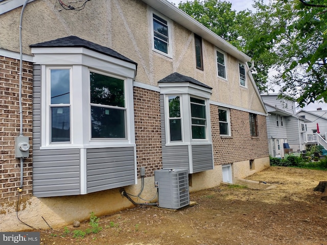 512 Mifflin Blvd, Reading, PA 19607 - back of house featuring brick siding