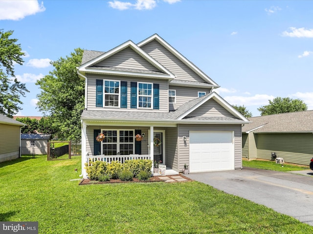 309 Legion St, Martinsburg, WV 25404 - traditional-style home featuring a porch, driveway, an attached garage, and a shingled roof