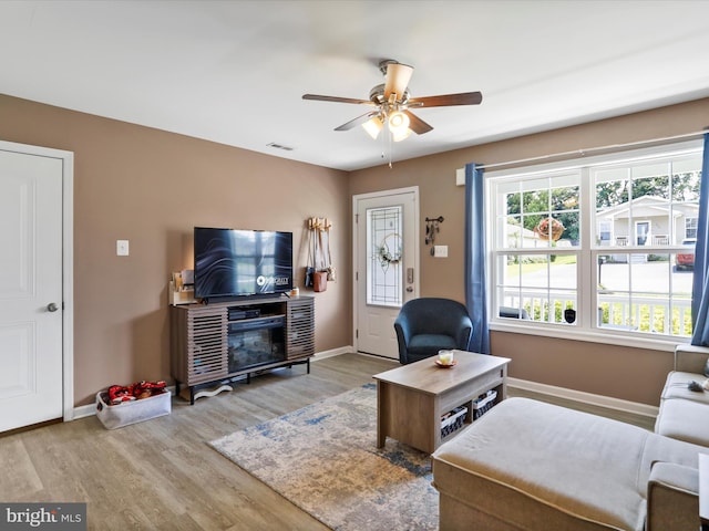 309 Legion St, Martinsburg, WV 25404 - living area with a ceiling fan and wood finished floors