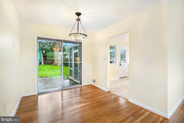 804 Gregorio Dr, Silver Spring, MD 20901 - unfurnished dining area featuring healthy amount of natural light and wood finished floors