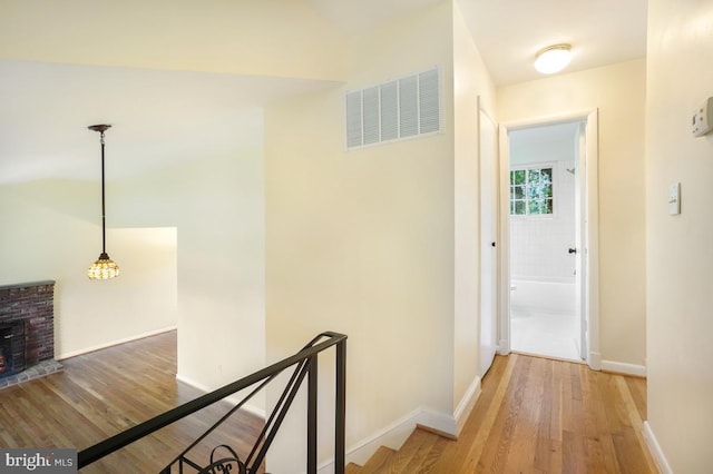 804 Gregorio Dr, Silver Spring, MD 20901 - hallway featuring light wood-style flooring and an upstairs landing