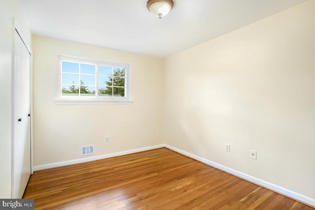 804 Gregorio Dr, Silver Spring, MD 20901 - unfurnished bedroom featuring wood finished floors and a closet