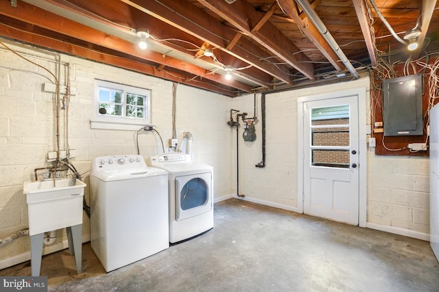 804 Gregorio Dr, Silver Spring, MD 20901 - laundry area with electric panel, washer and clothes dryer, and concrete block wall