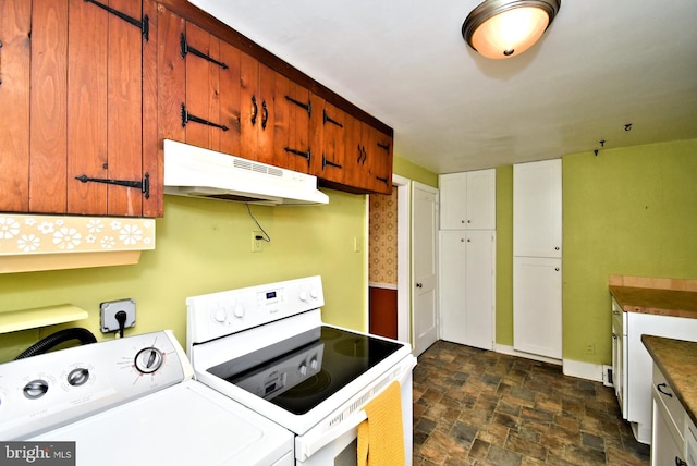 2228 Hillthorpe Ave, Abington, PA 19001 - kitchen with white electric stove, under cabinet range hood, stone finish flooring, washer and clothes dryer, and brown cabinets