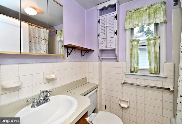 2228 Hillthorpe Ave, Abington, PA 19001 - bathroom with tile walls, vanity, a shower with shower curtain, and a wainscoted wall