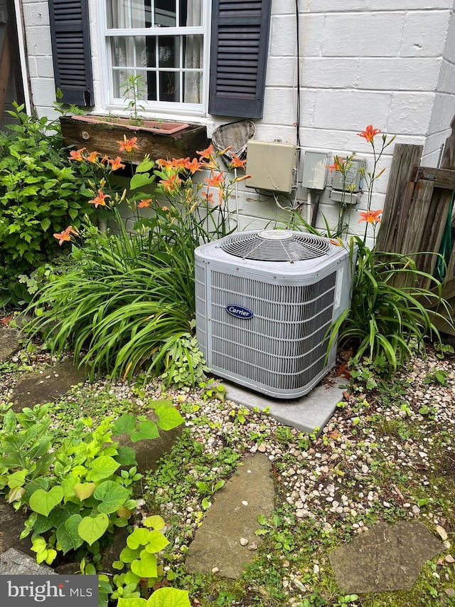 2228 Hillthorpe Ave, Abington, PA 19001 - exterior view of a central AC unit and concrete block siding