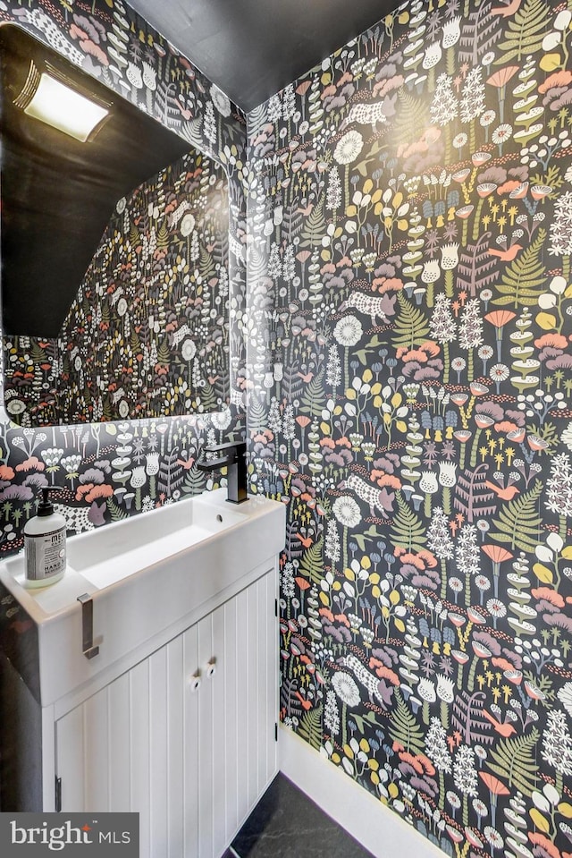 1532 N Capitol NW Unit 402, Washington, DC 20002 - bathroom with wallpapered walls and vanity