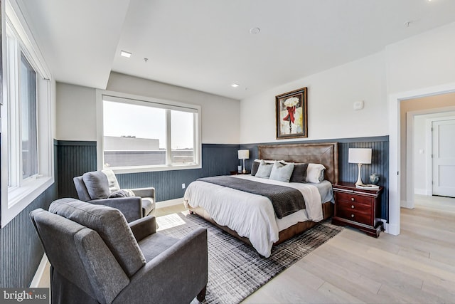 1532 N Capitol NW Unit 402, Washington, DC 20002 - bedroom with wainscoting and light wood-style flooring