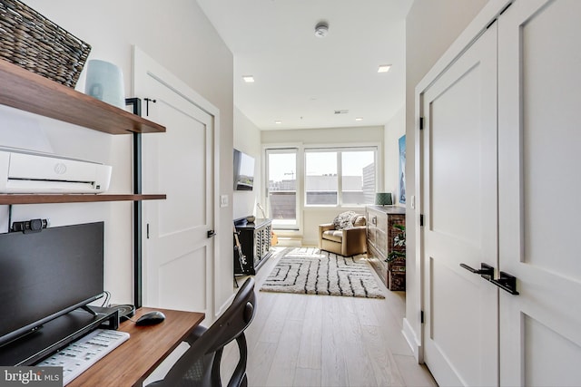 1532 N Capitol NW Unit 402, Washington, DC 20002 - office featuring light wood-type flooring and a wall mounted AC