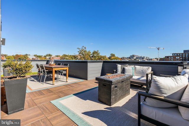 1532 N Capitol NW Unit 402, Washington, DC 20002 - wooden deck featuring an outdoor living space with a fire pit and outdoor dining space