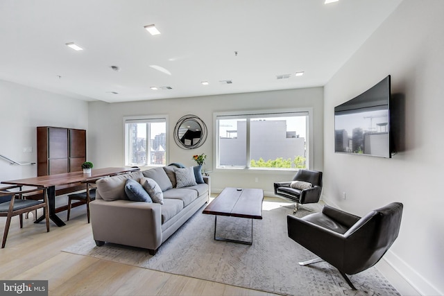 1532 N Capitol NW Unit 402, Washington, DC 20002 - living area featuring light wood-type flooring and baseboards