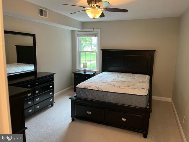 2803 Arlington Blvd Unit 130, Arlington, VA 22201 - bedroom featuring light carpet and a ceiling fan