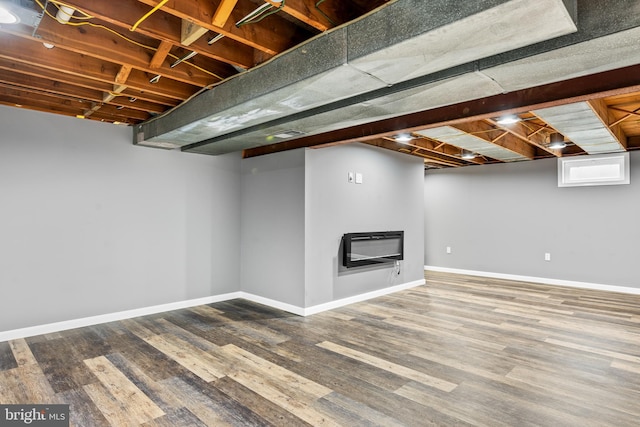 310 E Charlotte St, Millersville, PA 17551 - below grade area featuring wood finished floors and heating unit