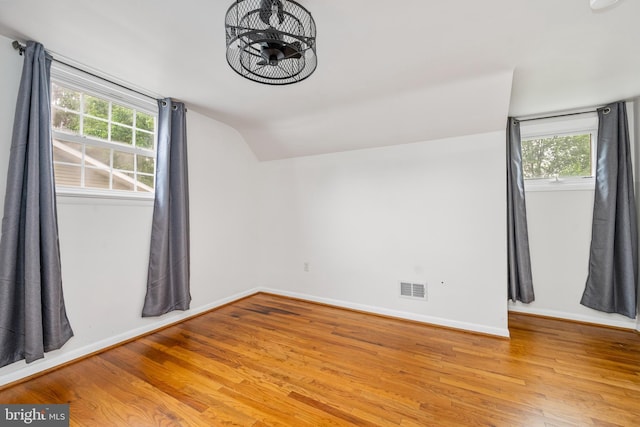 310 E Charlotte St, Millersville, PA 17551 - additional living space with wood finished floors, vaulted ceiling, and healthy amount of natural light