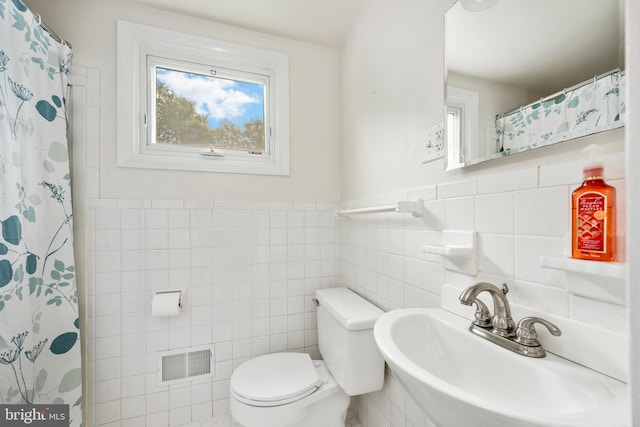 310 E Charlotte St, Millersville, PA 17551 - full bathroom with tile walls and a shower with curtain