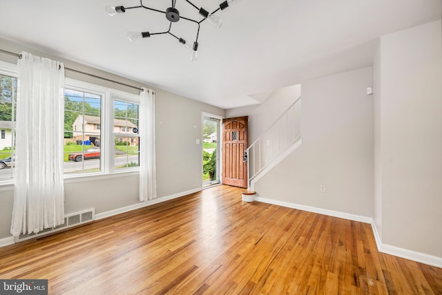 310 E Charlotte St, Millersville, PA 17551 - foyer with light wood finished floors and stairway