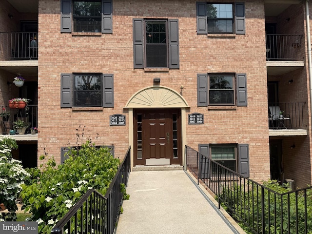 3011 Valley Dr Unit 3011, West Chester, PA 19382 - view of exterior entry featuring brick siding